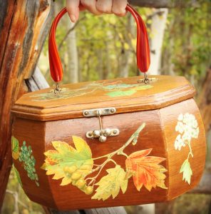 Vintage purse with fall leaves