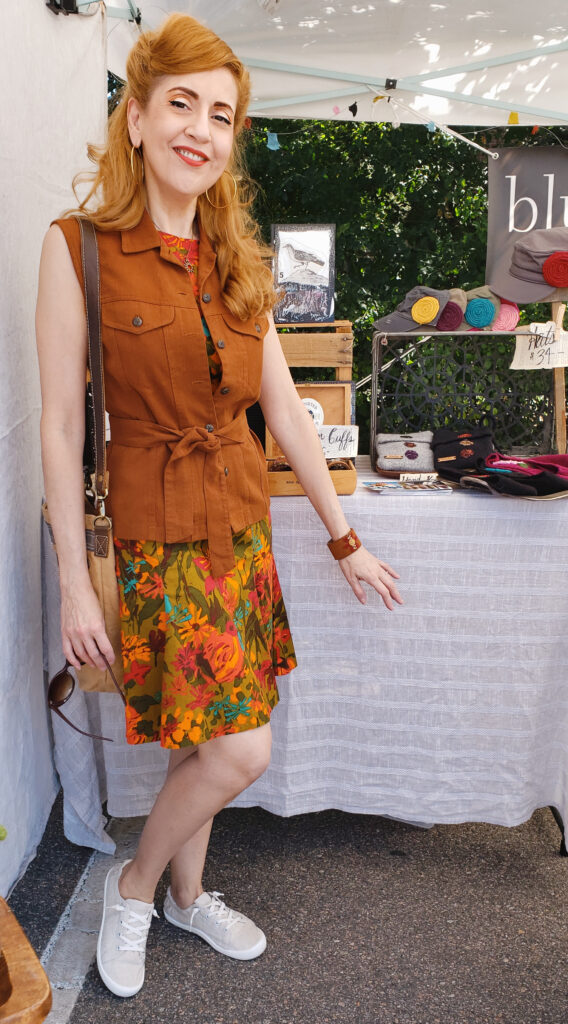 Girl in vintage dress and vest